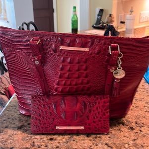 Brahmin red purse with matching wallet.  Gently used mint condition.